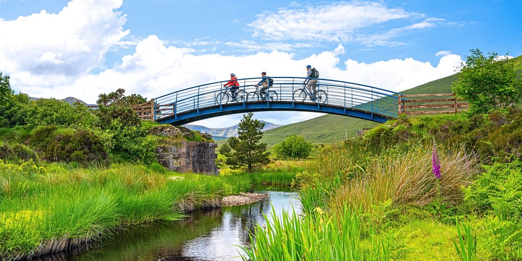 3 people cycling along the Greenway