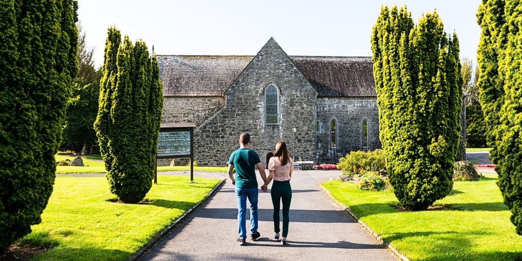 Couple walking towards Abbey entrance