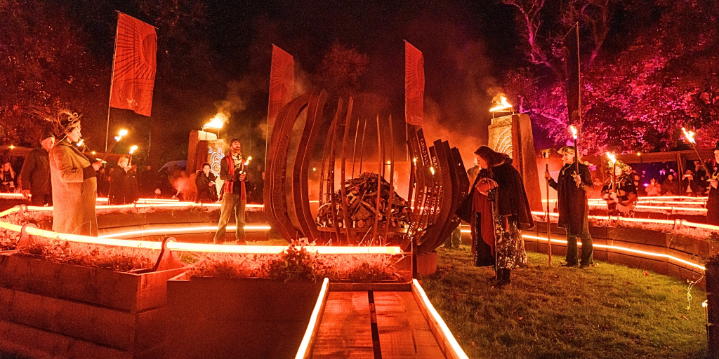 People performing a bonfire ritual