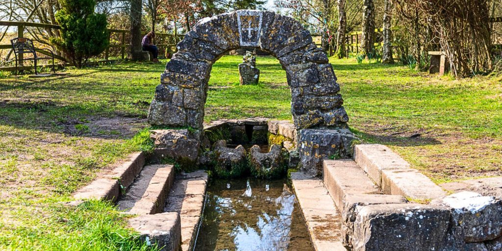 Stone archway over a well